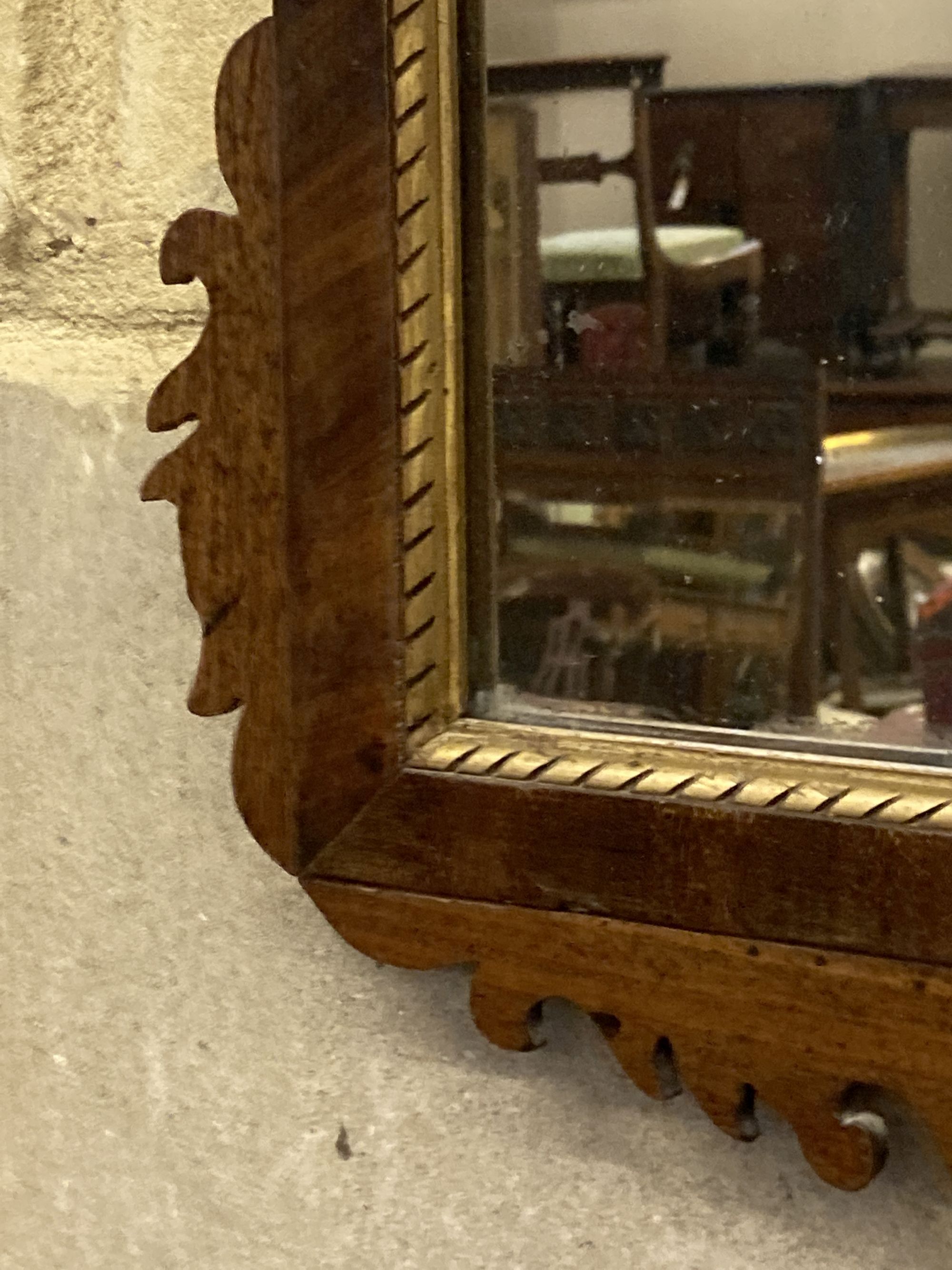 A George III style mahogany fret cut wall mirror, width 42cm, height 80cm